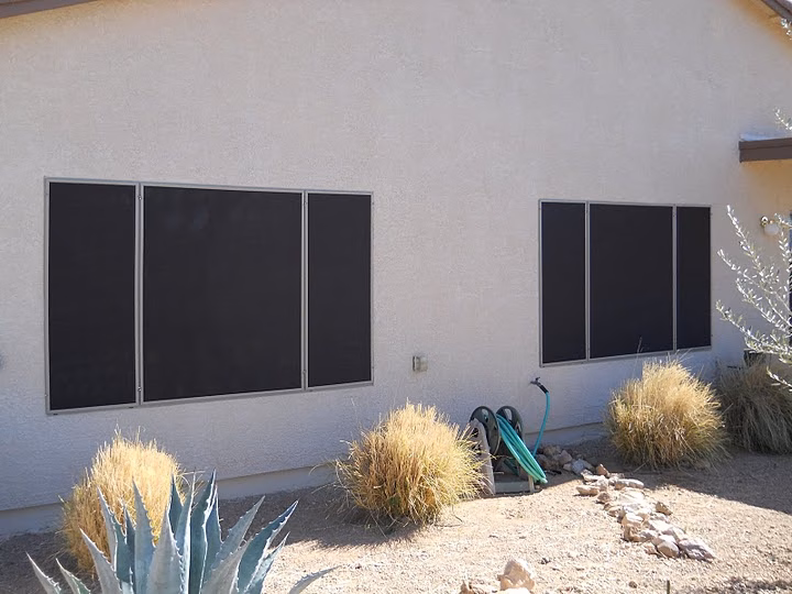 solar screens installed on 2 windows in the peoria area on a sunny day